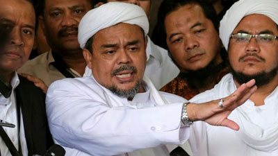Indonesian Muslim preacher named as porn case suspect