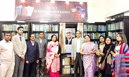 BILIA faculty in front of the Collection with Justice Rahman's family.