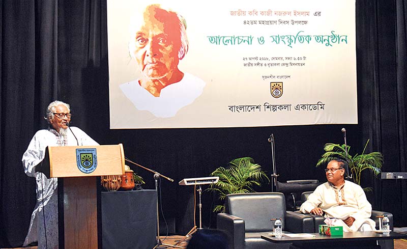 Poet Asad Chowdhury presented the keynote paper at the event