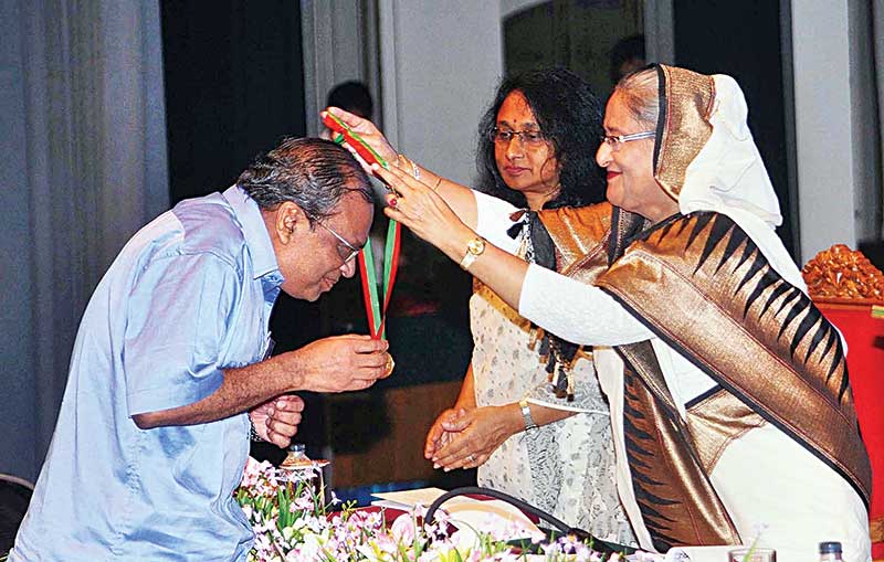 Prof Dr ABM Abdullah receives Ekushey Padak 2016 from PM Sheikh Hasina.