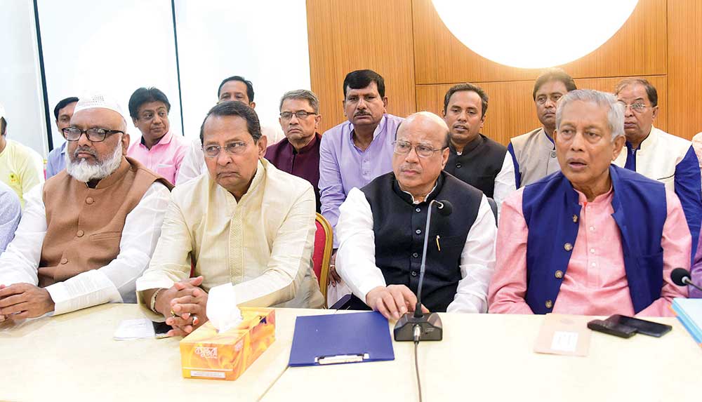 14-party alliance spokesperson and Awami League Presidium Member Mohammed Nasim along with other leaders of the alliance at a meeting held at AL central office in the capital's Bangabandhu Avenue on Saturday. photo : Observer