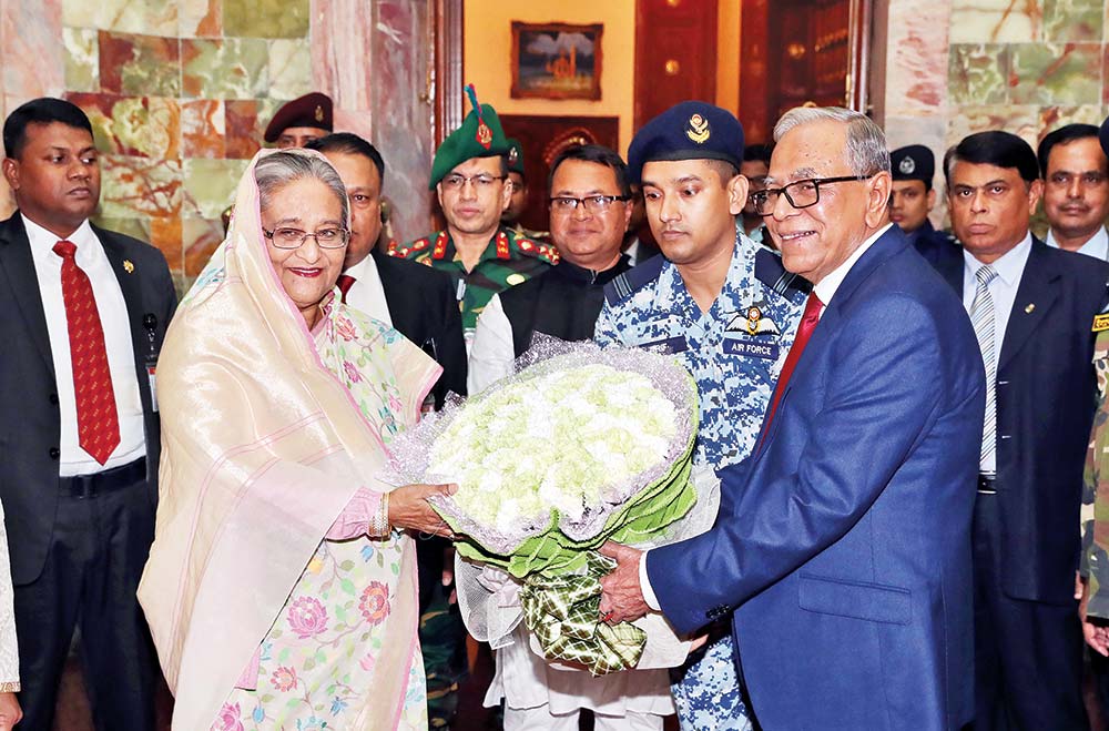 President Abdul Hamid greets Prime Minister Sheikh Hasina on her arrival at Bangabhaban on Thursday.	photo : pid