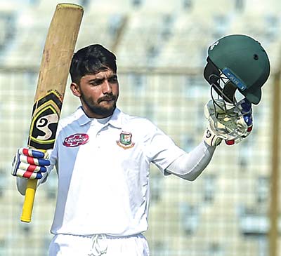 Bangladesh cricketer Mominul Haque reacts after scoring a century during the first day of the first Test cricket match against West Indies at the Zahur Ahmed Chowdhury Stadium in Chittagong on Thursday.	photo: AFP 