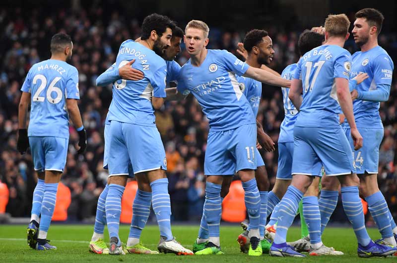 Manchester City's German midfielder Ilkay Gundogan (2L) celebrates scoring his team's third goal during the English Premier League football match between Manchester City and Leicester City at the Etihad Stadium in Manchester, north west England, on December 26, 2021. 	photo: AFP 