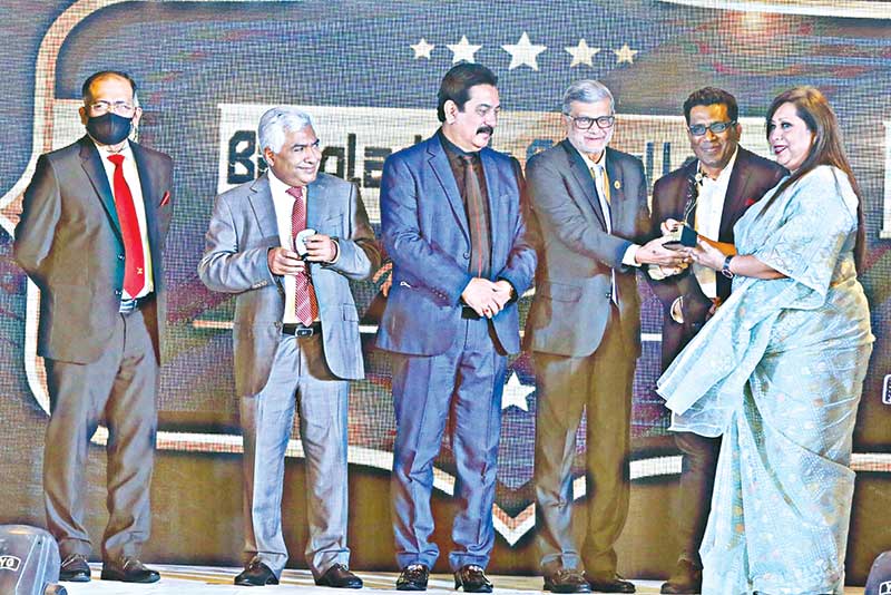 Planning Minister M A Mannan handing over Bangladesh Excellence Award - 2021" to PPP Authority CEO Sultana Afroz as Best Women Leader in the Public Sector at an event in city recently.