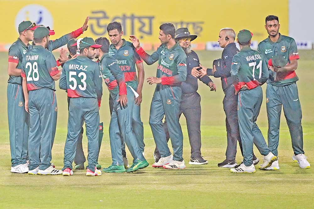 Bangladesh's players celebrate their win in the second one-day international (ODI) cricket match between Afghanistan and Bangladesh at the Zahur Ahmed Chowdhury Stadium in Chittagong on February 25, 2022.	PHOTO: AFP