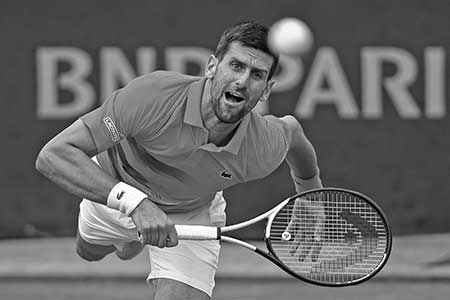 Serbia's Novak Djokovic serves the ball to Slovakia's Alex Molcan during their men's singles match on day four of the Roland-Garros Open tennis tournament at the Court Suzanne-Lenglen in Paris on May 25, 2022.	photo: AFP 