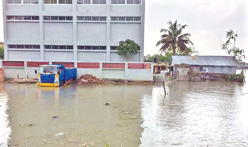 The photo shows a submerged area in Indurkani Upazila.	photo: observer
