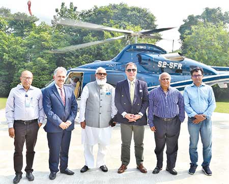 Lord Karan Bilimoria CBE, DL,  Member House of Lords, UK (3rd from right), Salman F Rahman, MP, Private Sector Industry and Investment Adviser to Bangladesh Prime Minister Sheikh Hasina (3rd from left) along with other guests and hosts pose for photograph at Beximco Industrial Park  on Tuesday.