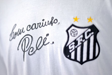 Picture of a jersey of Brazilian team Santos  autographed by football legend Pele.	photo: AFP 