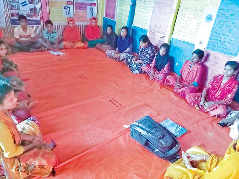 A session on 'making girls aware about the demerits of early marriage' going on in Barguna.	photo: observer