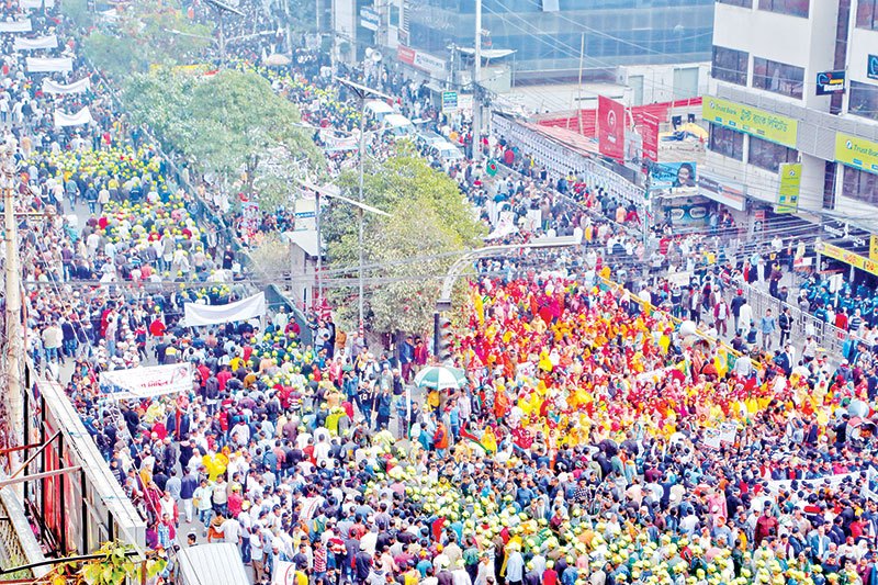 BNP activists in front of party central office moments before to start a procession on Friday. (Inset) BNP leader Khandaker Mosharraf Hossain addressing the rally. 	PHOTO: OBSERVER