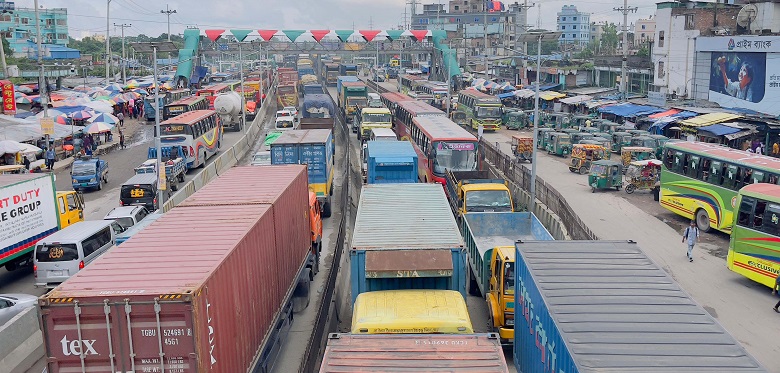 A long tail back of stranded vehicles was seen on the Dhaka-Ctg highway in Narayanganj's Sonargaon upazila on Wednesday. Photo: Observer