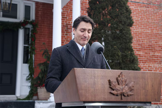 Canada's Prime Minister Justin Trudeau speaks to reporters, announcing he intends to step down as Liberal Party leader, but he will stay on in his post until a replacement has been chosen, from his Rideau Cottage residence in Ottawa, Ontario, Canada, January 6, 2025. REUTERS/Patrick Doyle/File Photo 