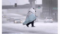 Massive winter storm sweeps across US bringing ice, frigid temps