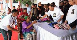 PM distributing clothes, food among poor marking Zia's death anniv
