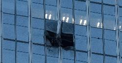 Pilot dies, 13 injured as small plane crashes into Beijing high-rise