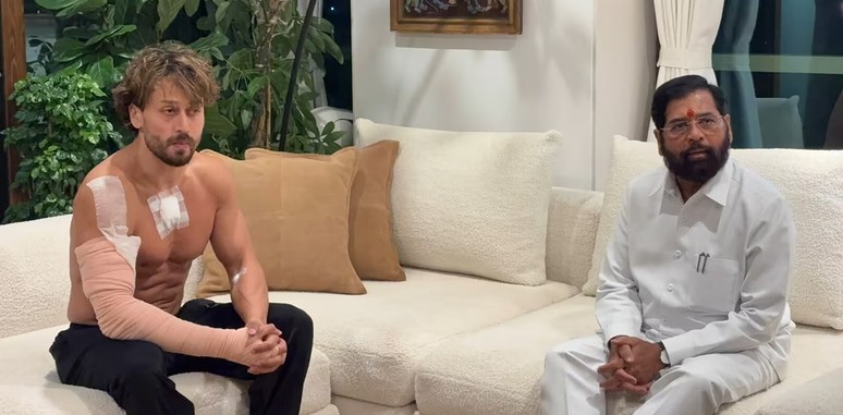 Maharashtra Deputy Chief Minister Eknath Shinde, right, during a meeting with Tiger Shroff