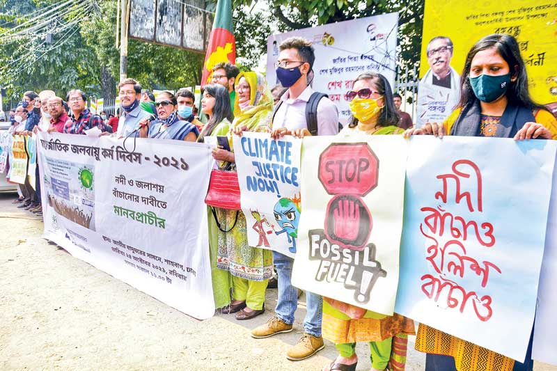 Waterkeepers, a platform of environmentalists, forms a human chain at Shahbagh