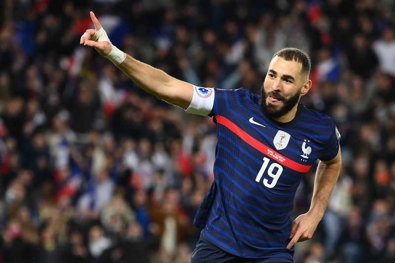 (FILES) In this file photo taken on November 13, 2021 France's forward Karim Benzema celebrates after scoring a goal during the FIFA World Cup 2022 qualification football match between France and Kazakhstan at the Parc des Princes stadium in Paris.	photo: AFP 