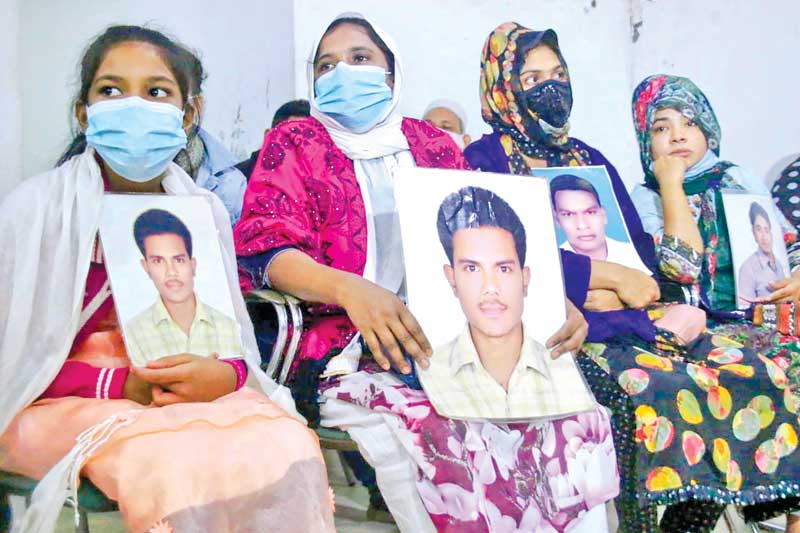Relatives of the victims of enforced disappearances under the banner of 'Mayer Dak' hold a press conference at the National Press Club in the capital on Saturday. photo : Observer
