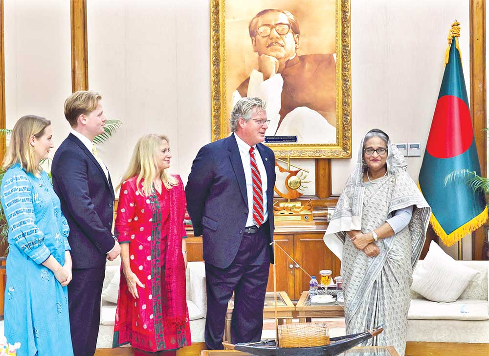Late US Senator Edward M Kennedy's son Ted Kennedy Jr and his three family members paid a courtesy call on Prime Minister Sheikh Hasina at her official residence, Ganabhaban in the city on Sunday. PHOTO: BSS