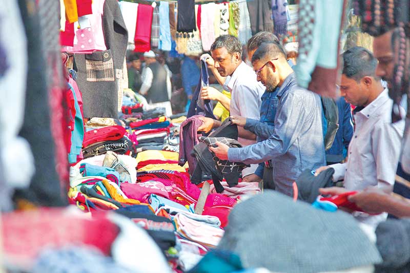 People busy buying warm clothes in the city ahead of this year