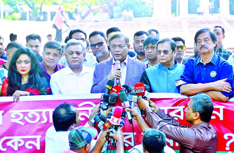 Information and Broadcasting Minister Dr Hasan Mahmud MP addressing a human chain formed by Bangabandhu Sangskritik Jote in front of the Central Shaheed Minar in the capital on Thursday.	PHOTO: OBSERVER