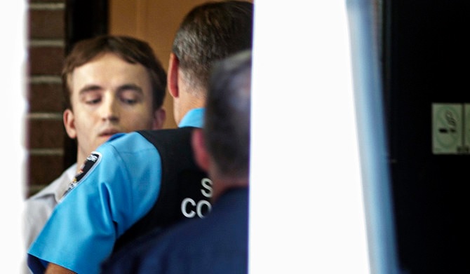 Nathaniel Veltman is escorted while leaving trial outside Ontario Superior Court in Windsor, Ontario, Tuesday, Sept.5, 2023. (AP)