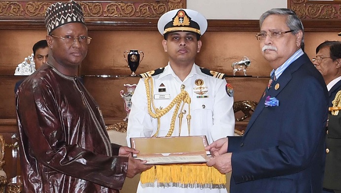 President Mohammed Shahabuddin (right) receives credentials of newly appointed  High Commissioner of Gambia Mustapha Jawara at Bangabhaban in Dhaka on Wednesday (January 31, 2024) 