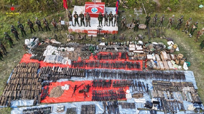 The Arakan Army with seized junta weapons and ammunition from Light Infantry Battalion 539 in Kyauktaw Township on January 16. PHOTO: Arakan Army