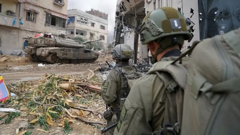 Israeli soldiers operate in the Gaza Strip in this handout picture released on February 4, 2024. (Reuters)