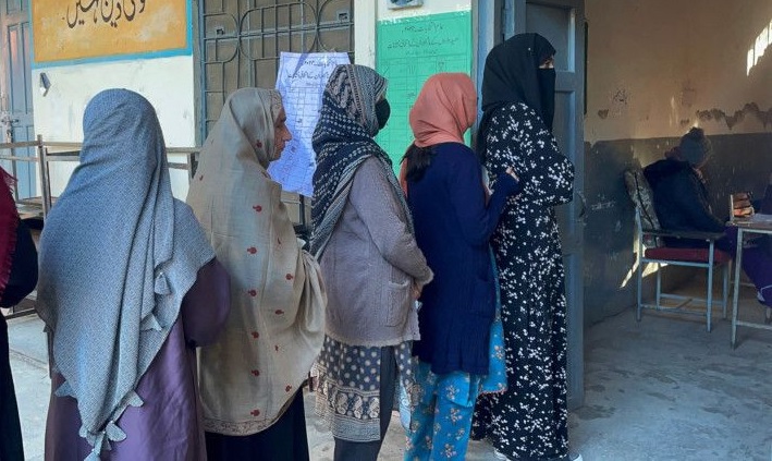 Women queue up to vote in Rawalpindi. PHOTO: AFP