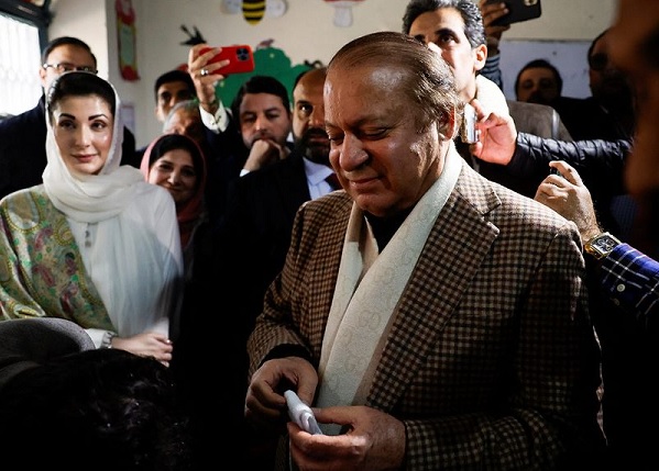 Former Prime Minister Nawaz Sharif smiles on the day he casts his vote in Lahore. PHOTO: REUTERS