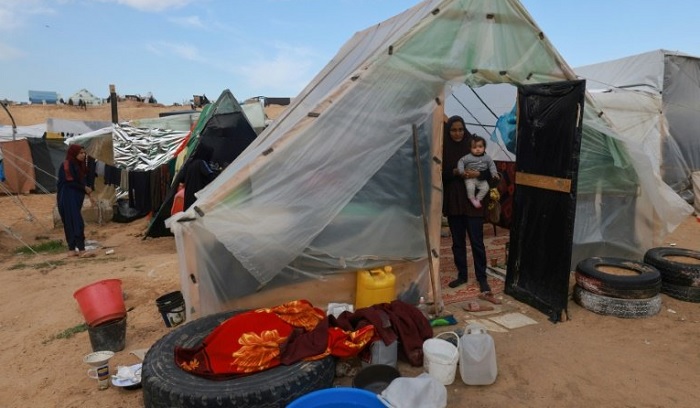 Hundreds of thousands of people have been driven into Rafah, seeking shelter in a sprawling makeshift encampment / © AFP  Palestinian patients arrive in Rafah after they were evacuated from Nasser hospital due to the Israeli ground operation on Feb 15. PHOTO: REUTERS