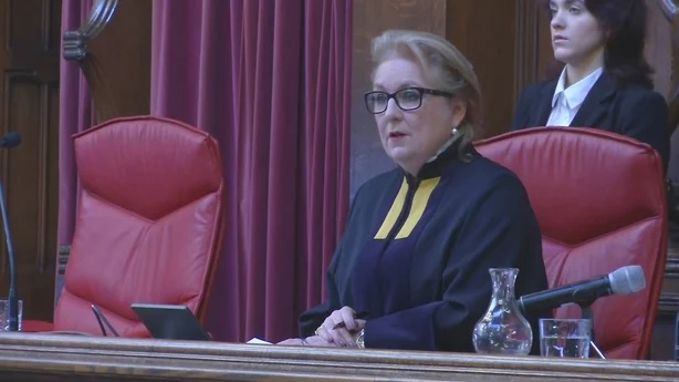 Chief Justice Sue Carr is seen giving her ruling 