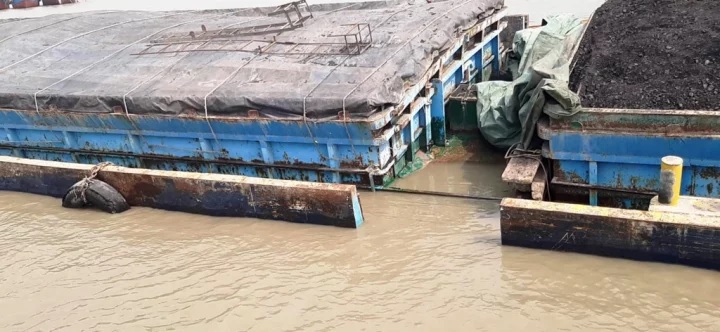 A cargo vessel, named "MV Ishra Mahmud" with 950 tonnes of coal capsizes in the Pasur river of Mongla Port 