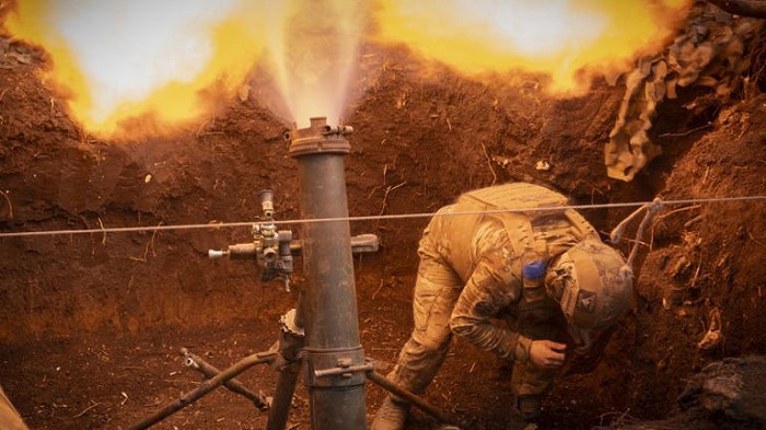 Ukrainian servicemen of the 28th Separate Mechanised Brigade fires a 122mm mortar towards Russian positions at the front line, near Bakhmut, Donetsk region, Ukraine, on March 4, 2024. PHOTO: AP