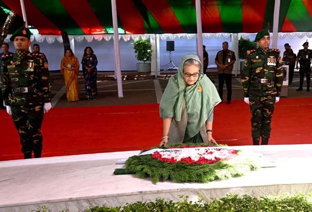 Prime Minister Sheikh Hasina places a floral wreath at the mausoleum of Father of the Nation Bangabandhu Sheikh Mujibur Rahman at Tungipara in Gopalganj on Friday.