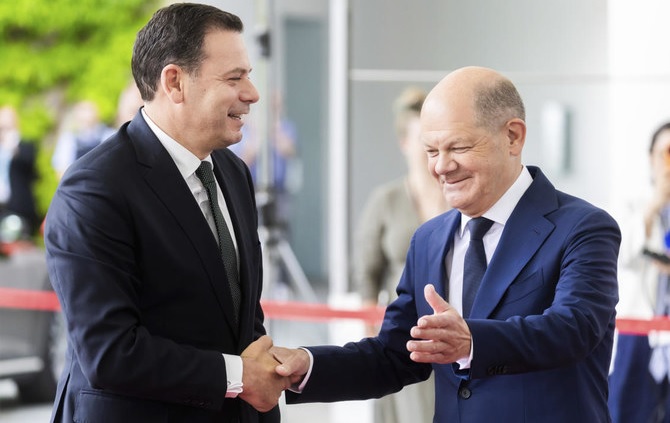 German Chancellor Olaf Scholz welcomes Portugal's Prime Minister Luis Montenegro during their meeting at the Federal Chancellery in Berlin on May 24, 2024. (AP)