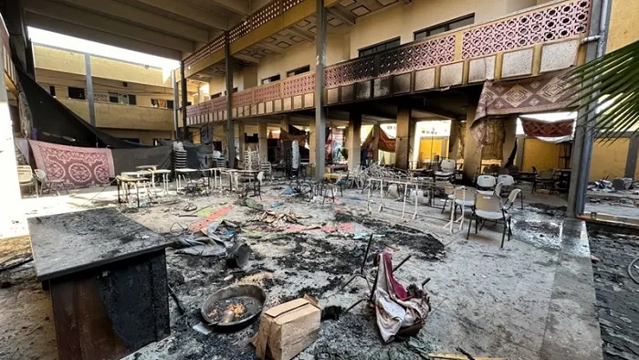 Damaged chairs stand amid debris at Shadia Abu Ghazaleh school following an Israeli raid, amid the ongoing conflict between Israel and Palestinian militant group Hamas, in Jabalia in the northern Gaza Strip, December 15, 2023. (Reuters)