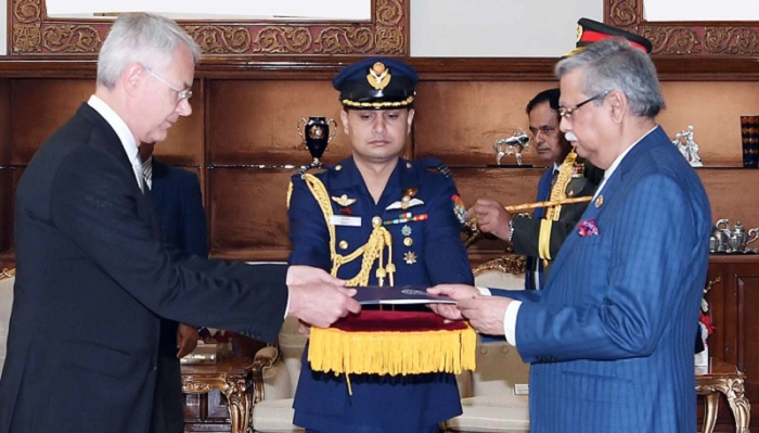 Newly-appointed ambassador of Finland Kimmo Lahdevirta presents his credential to President Mohammed Shahabuddin at Bangabhaban in Dhaka on Tuesday, May 28, 2024