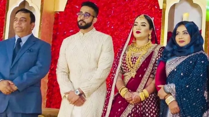 Former IGP Benazir Ahmed and his wife Jishan Mirza at the wedding ceremony of their elder daughter Farheen Rishta at a hotel in Dhaka on December 10, 2021