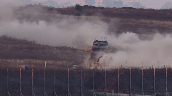 An Israeli tank manoeuvres inside Gaza, amid the ongoing conflict between Israel and the Palestinian Islamist group Hamas, as seen from Israel, May 28, 2024. REUTERS/Amir Cohen