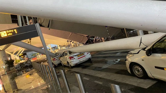 The photo shows a pillar on top of some parked cars after the roof of Delhi airport collapsed on Friday, June 28, 2024. Photo: Collected 