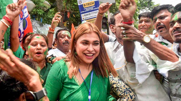 TMC supporters celebrate with Shreya Pandey, daughter of party candidate Supti Pandey, as she leads from Maniktala constituency during counting of votes for Assembly by-election, in Kolkata, Saturday, July 13, 2024. (PTI)