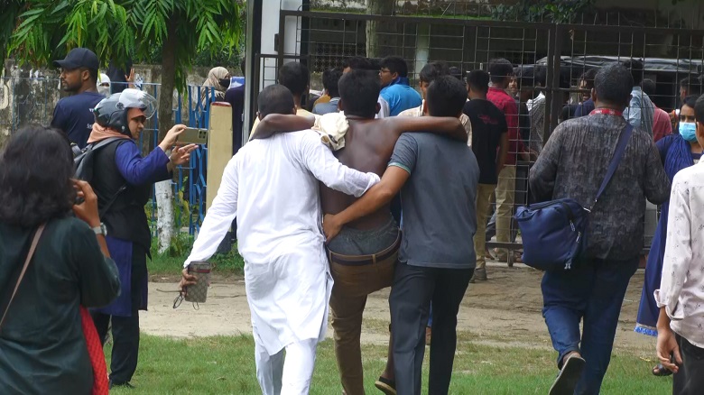 An injured is being taken to a nearby hospital after the clash in Jhenaidah. Photo: Observer