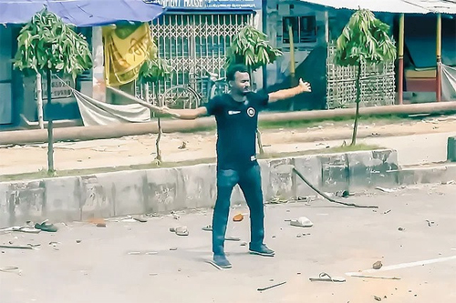 Abu Sayeed, a student of Rokeya University in Rangpur, is seen stood firm and refused to move during a clash between police and protesters centering Quota Reform Movement on  July 16. Photo: Collected 