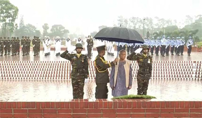 Dr Muhammad Yunus pays homage to the martyrs of liberation war by placing wreaths at the National Martyrs' Memorial in Savar on Friday morning. Photo: Collected