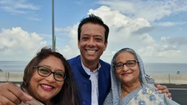 Sheikh Hasina, her son Sajeeb Wazed Joy and her daughter Saima Wazed Putul are seen on the Padma Bridge in this undated file image. 